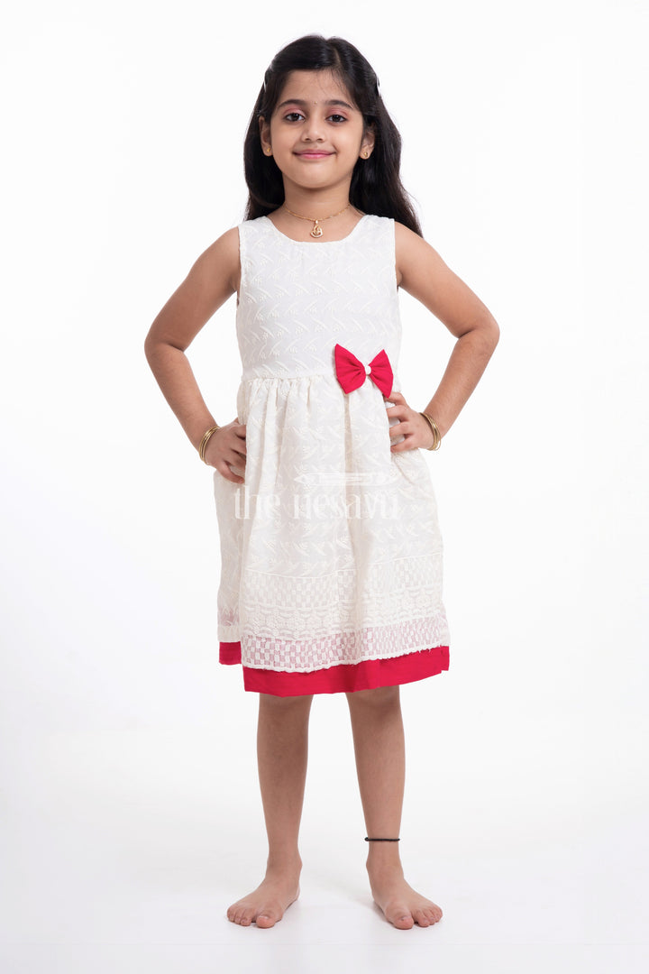 The Nesavu Girls Casual Gown Elegant Bacchon Ka Frock - Sleeveless Chikankari Baby Dress with Red Bow Nesavu Elegant Bacchon Ka Frock - Nesavu | Chikankari Baby Dress with Red Bow