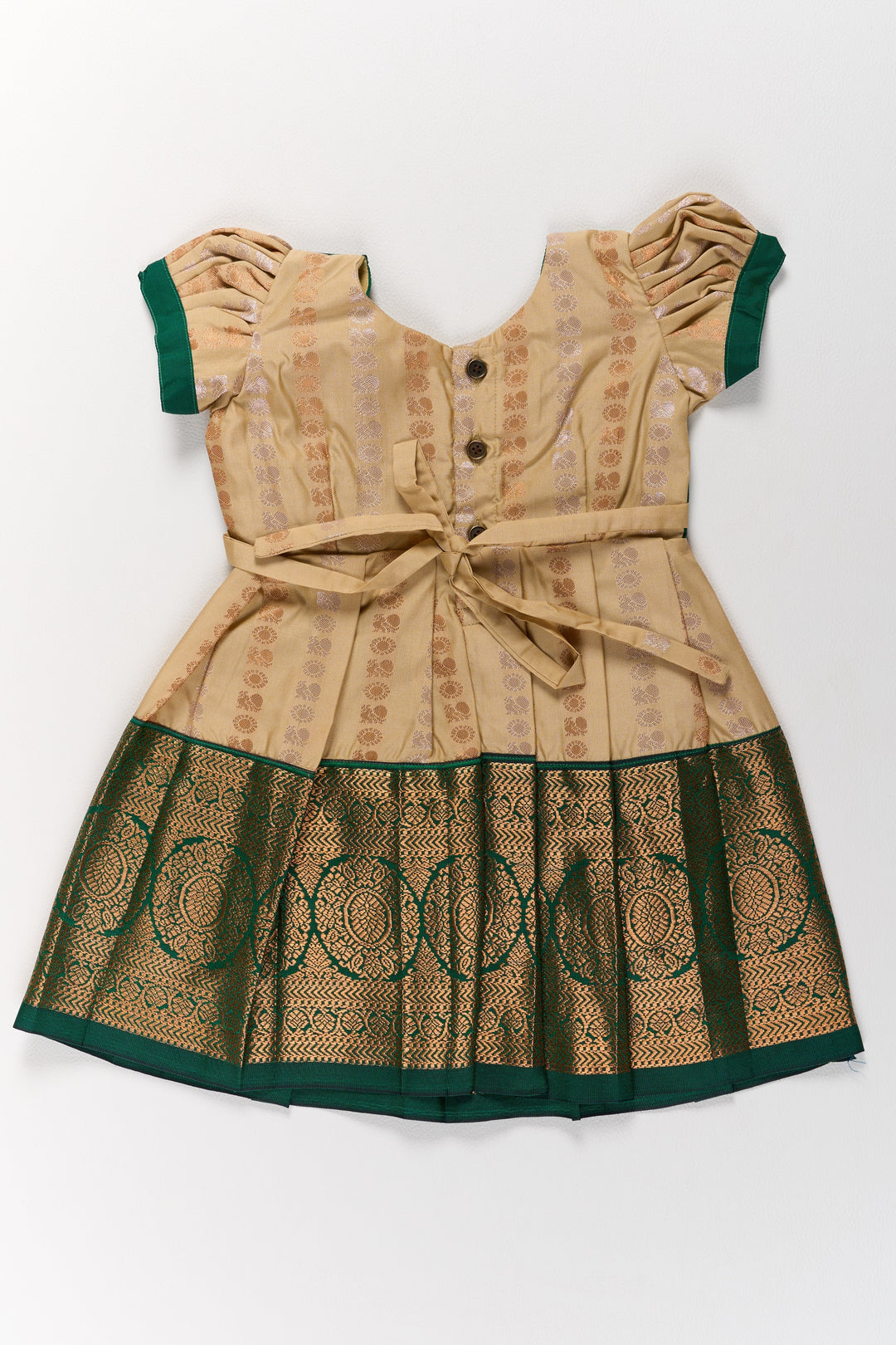 The Nesavu Girls Kanchi Silk Frock Elegant Cream and Green Pattu Pavadai for Girls with Traditional Zari Accents Nesavu Elegant Cream Green Pattu Pavadai Girls Traditional Zari Accents | The Nesavu