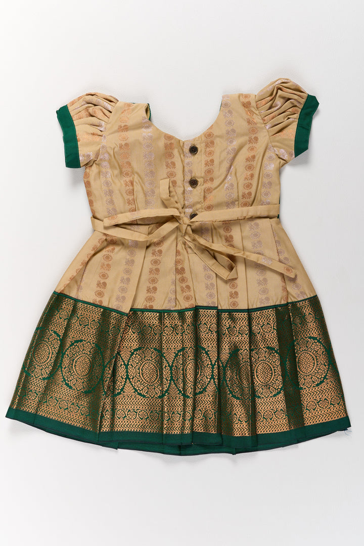 The Nesavu Girls Kanchi Silk Frock Elegant Cream and Green Pattu Pavadai for Girls with Traditional Zari Accents Nesavu Elegant Cream Green Pattu Pavadai Girls Traditional Zari Accents | The Nesavu