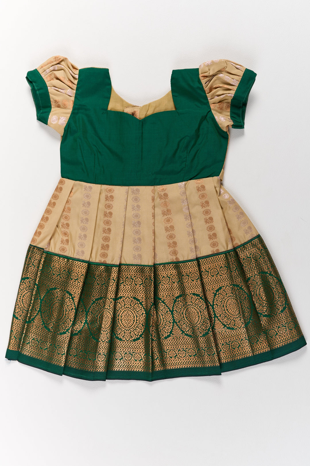 The Nesavu Girls Kanchi Silk Frock Elegant Cream and Green Pattu Pavadai for Girls with Traditional Zari Accents Nesavu Elegant Cream Green Pattu Pavadai Girls Traditional Zari Accents | The Nesavu