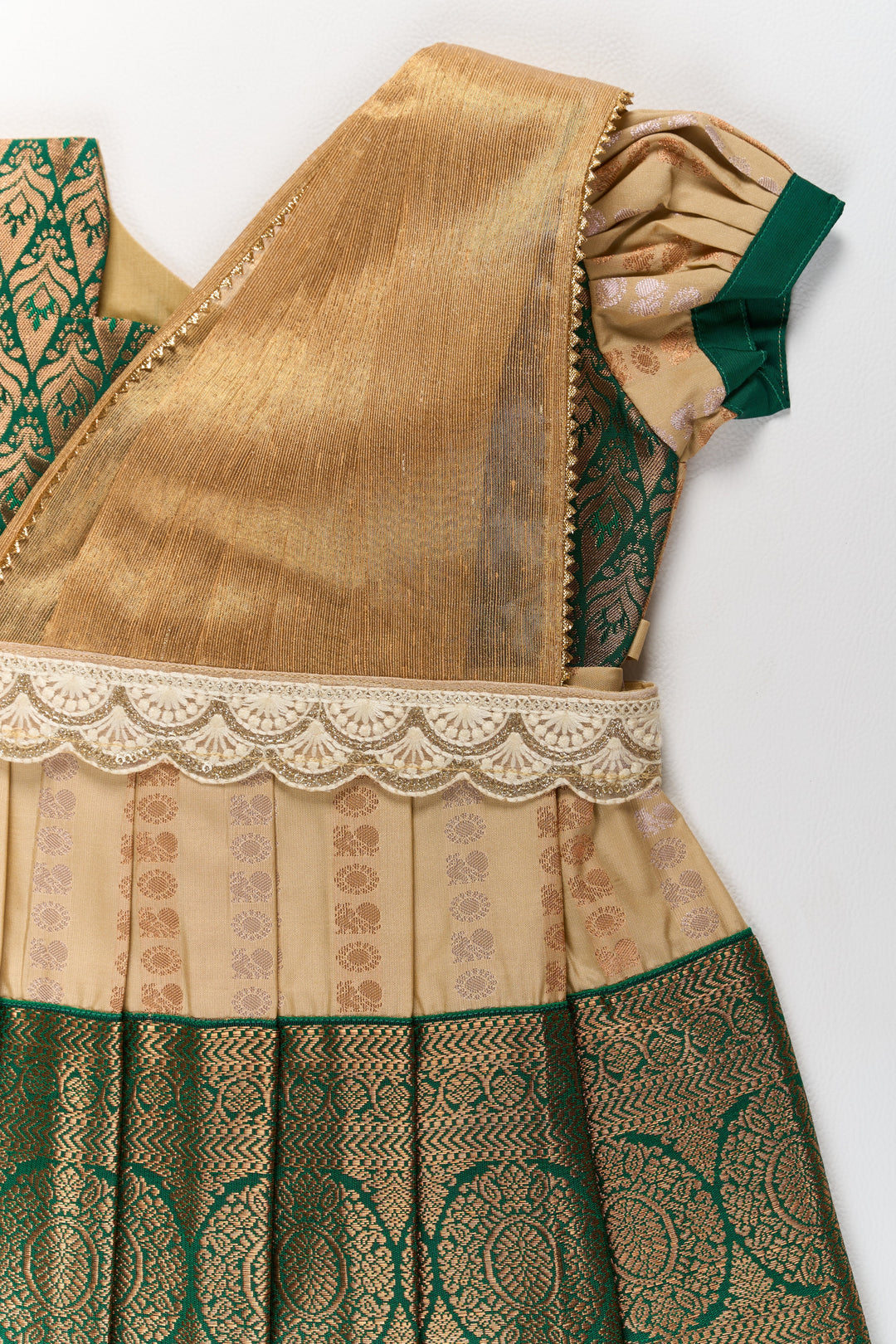 The Nesavu Girls Kanchi Silk Frock Elegant Cream and Green Pattu Pavadai for Girls with Traditional Zari Accents Nesavu Elegant Cream Green Pattu Pavadai Girls Traditional Zari Accents | The Nesavu