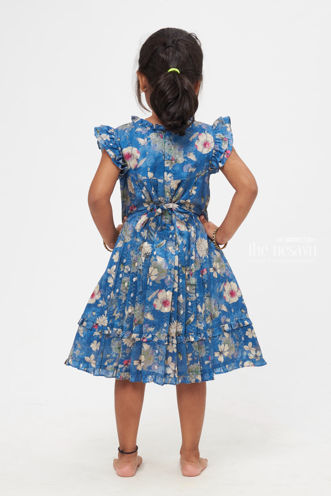 The Nesavu Girls Cotton Frock Elegant Floral-Printed Blue Frock with Pleats for Girls Nesavu Captivating Floral-Printed Blue Frock for Girls | Nature-inspired Elegance | The Nesavu