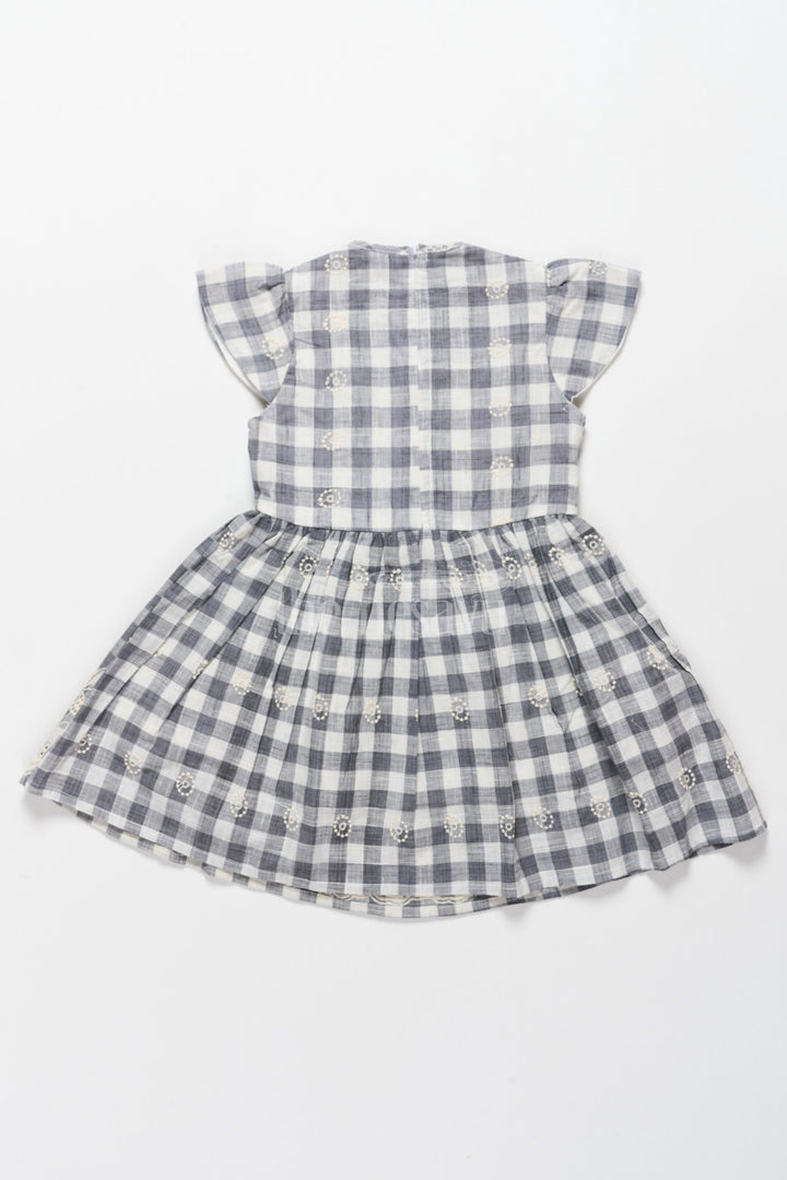 The Nesavu Girls Cotton Frock Elegant Girls Hakoba Cotton Frock with Classic Black and White Checkered Print – Cocktail and Party Frocks Nesavu Nesavu Classic Black White Checkered Hakoba Cotton Frock Embroidery  Cocktail Party Frocks