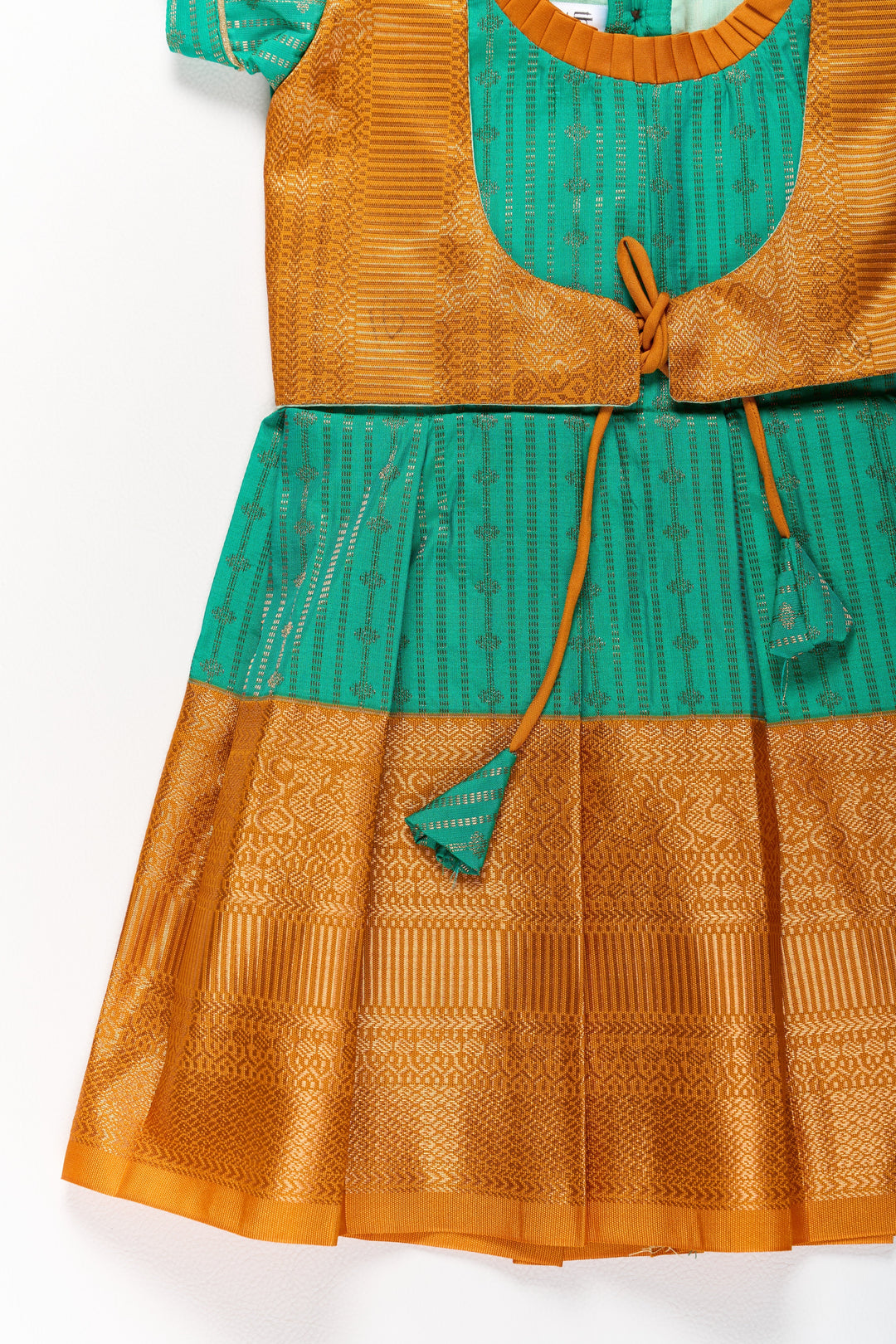 The Nesavu Girls Kanchi Silk Frock Elegant Green and Gold Pattu Full Frock for Girls with Traditional Zari Weaving Nesavu Elegant Green Gold Pattu Full Frock Girls Traditional Zari Weaving | The Nesavu