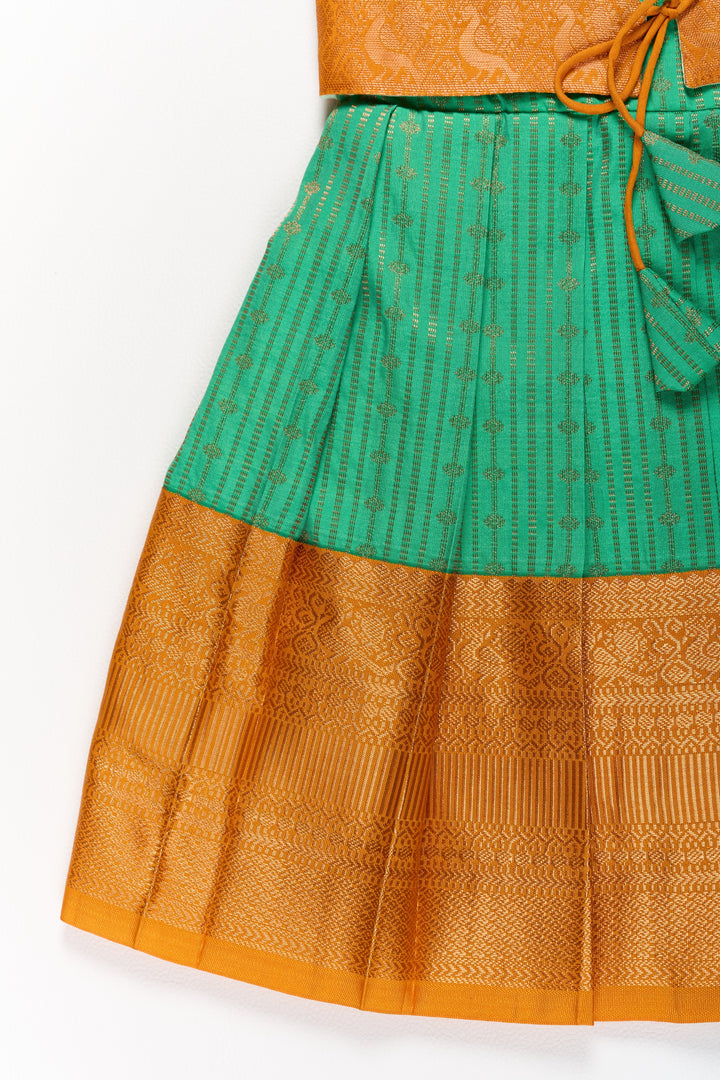 The Nesavu Girls Kanchi Silk Frock Elegant Green and Gold Pattu Full Frock for Girls with Traditional Zari Weaving Nesavu Elegant Green Gold Pattu Full Frock Girls Traditional Zari Weaving | The Nesavu