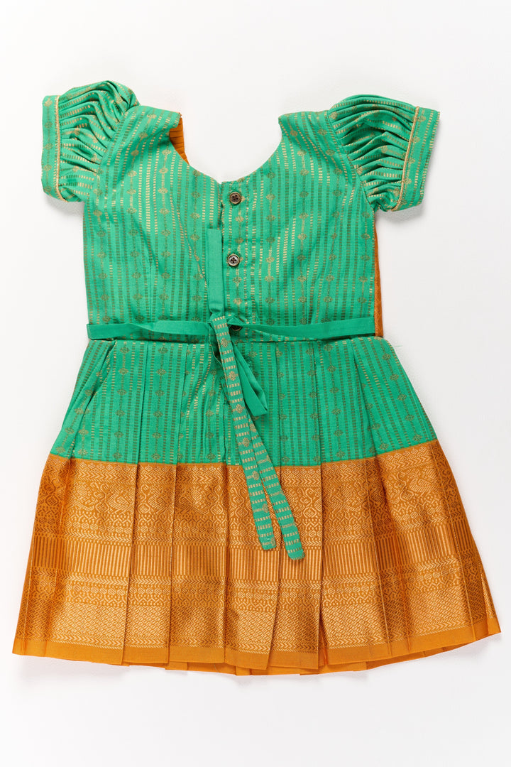 The Nesavu Girls Kanchi Silk Frock Elegant Green and Gold Pattu Full Frock for Girls with Traditional Zari Weaving Nesavu Elegant Green Gold Pattu Full Frock Girls Traditional Zari Weaving | The Nesavu