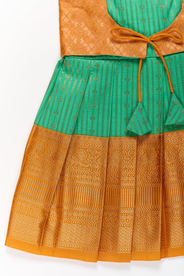 The Nesavu Girls Kanchi Silk Frock Elegant Green and Gold Pattu Full Frock for Girls with Traditional Zari Weaving Nesavu Elegant Green Gold Pattu Full Frock Girls Traditional Zari Weaving | The Nesavu