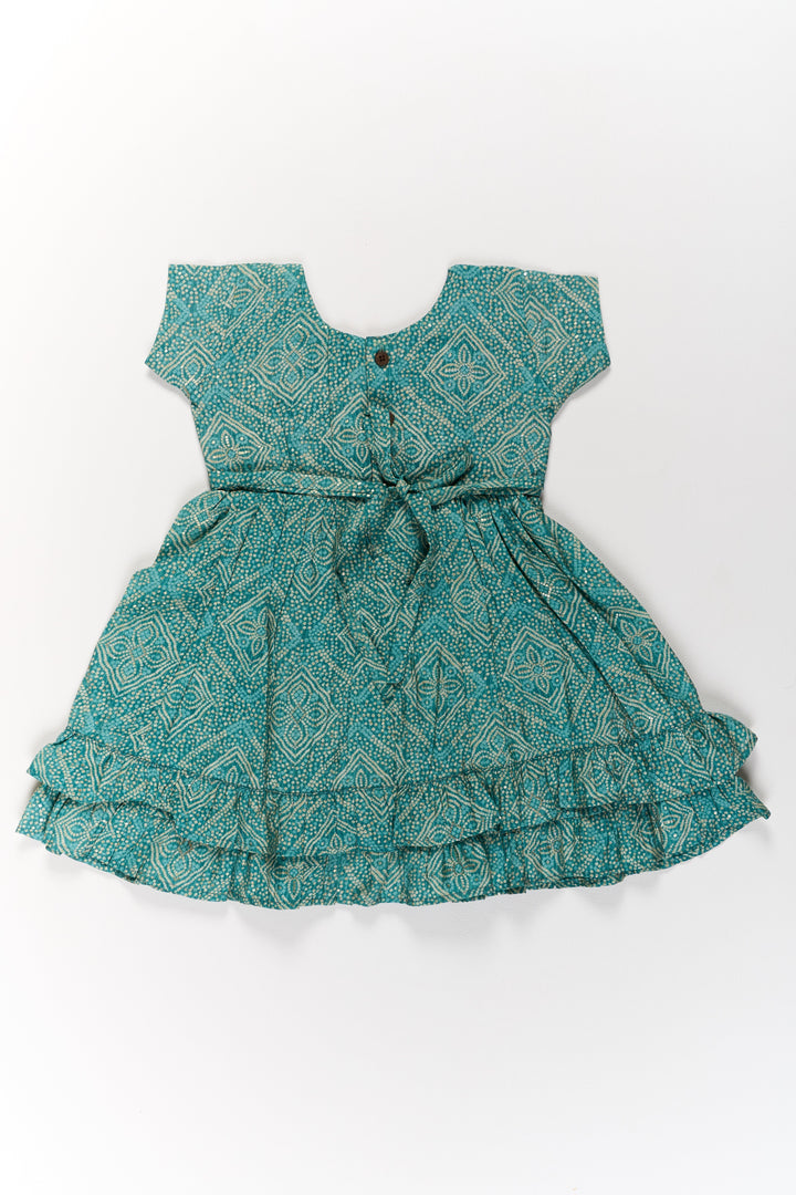 The Nesavu Girls Cotton Frock Elegant Green Cotton Girls Frock with Floral Print and Lace Detailing for Casual Wear Nesavu Elegant Green Cotton Girls Frock Floral Print Lace Detailing Casual Wear | The Nesavu