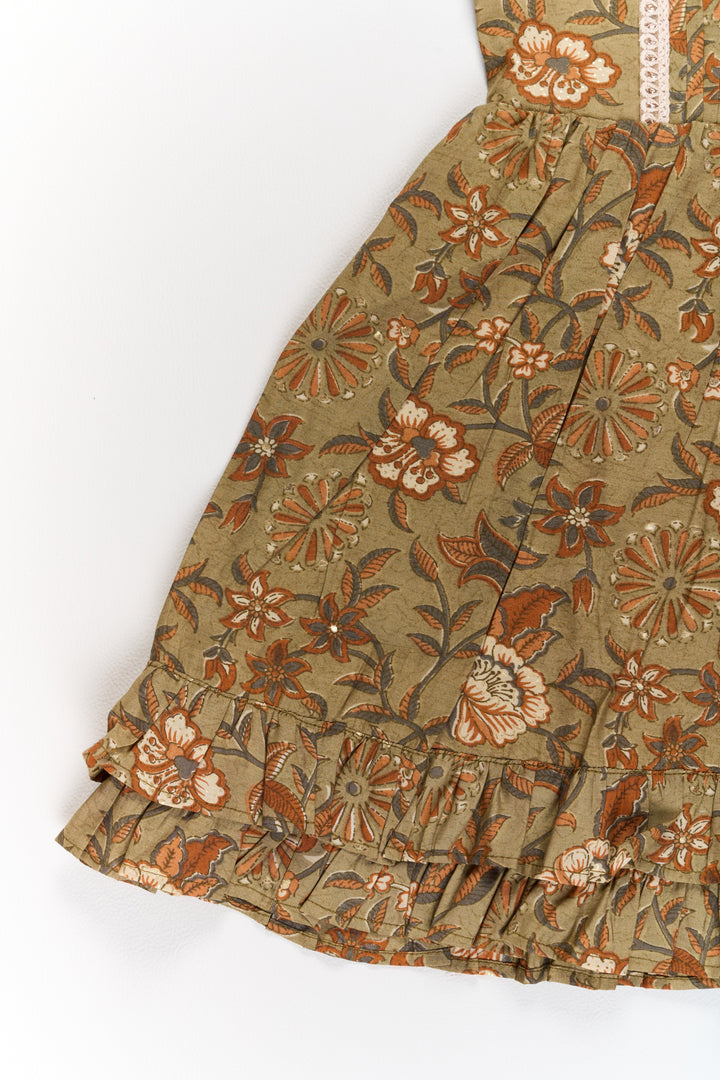 The Nesavu Girls Cotton Frock Elegant Green Cotton Party Wear Frock for Girls with Floral Prints and Ruffle Hem Nesavu Elegant Green Cotton Party Wear Frock Girls Floral Prints Ruffle Hem | The Nesavu