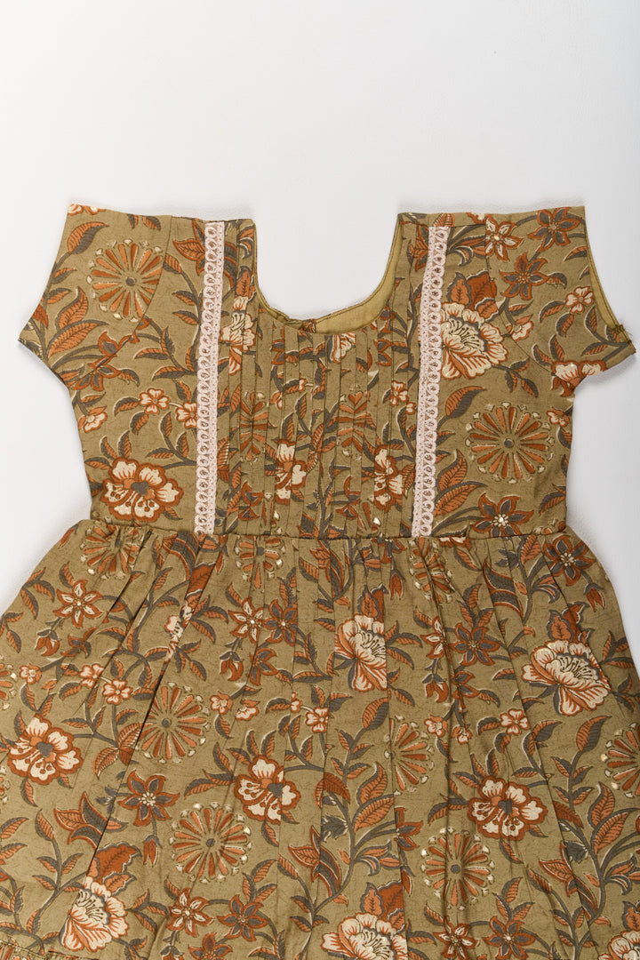 The Nesavu Girls Cotton Frock Elegant Green Cotton Party Wear Frock for Girls with Floral Prints and Ruffle Hem Nesavu Elegant Green Cotton Party Wear Frock Girls Floral Prints Ruffle Hem | The Nesavu