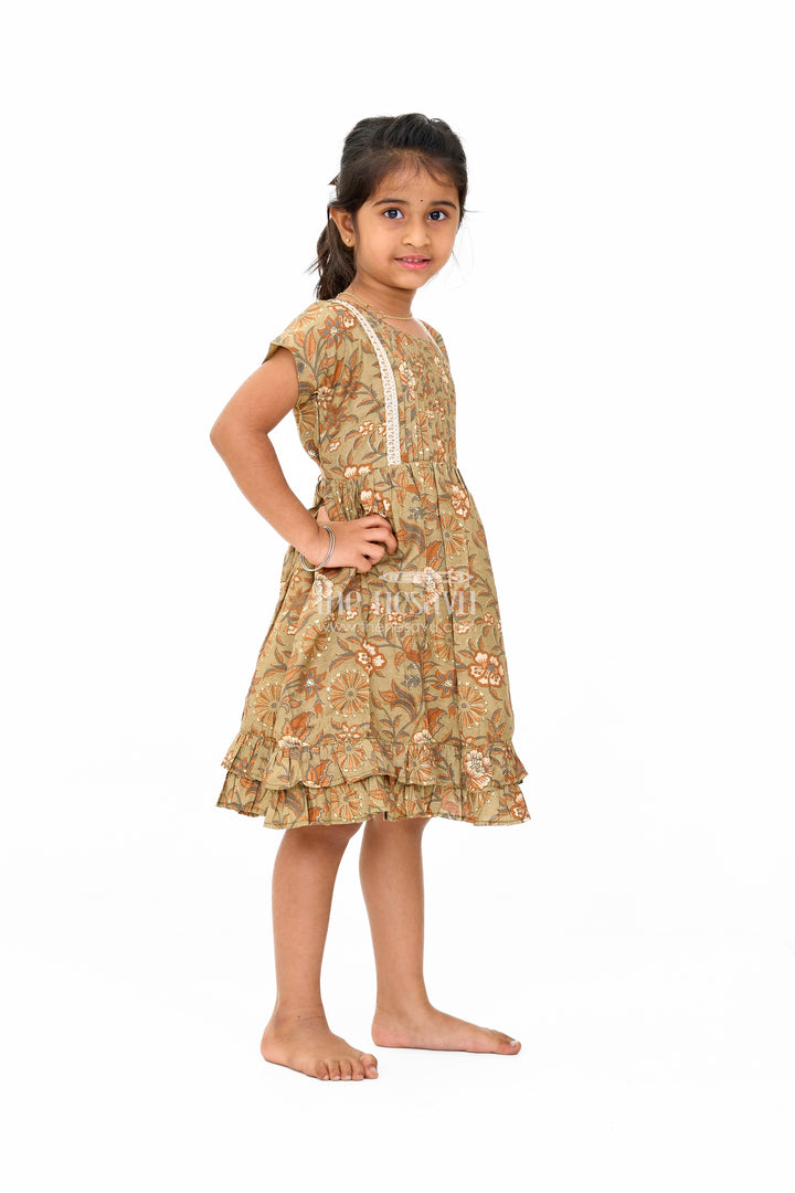 The Nesavu Girls Cotton Frock Elegant Green Cotton Party Wear Frock for Girls with Floral Prints and Ruffle Hem Nesavu Elegant Green Cotton Party Wear Frock Girls Floral Prints Ruffle Hem | The Nesavu
