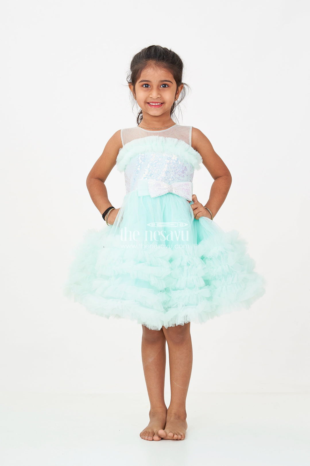 The Nesavu Girls Fancy Party Frock Elegant Green Net Dinner Dress for Girls with Ruffles and a Sequin Bow Nesavu Elegant Green Net Dinner Dress Girls Ruffles Sequin Bow | The Nesavu