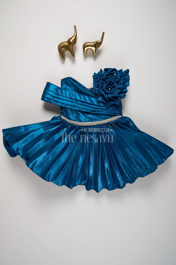 The Nesavu Girls Fancy Party Frock Elegant Navy Blue One-Shoulder Party Frock with Pleated Skirt and Silver Waistband for Girls Nesavu 16 (1Y) / Blue PF189D-16 Nesavu Navy Blue One-Shoulder Party Frock Girls Pleated Skirt Floral Embellishment