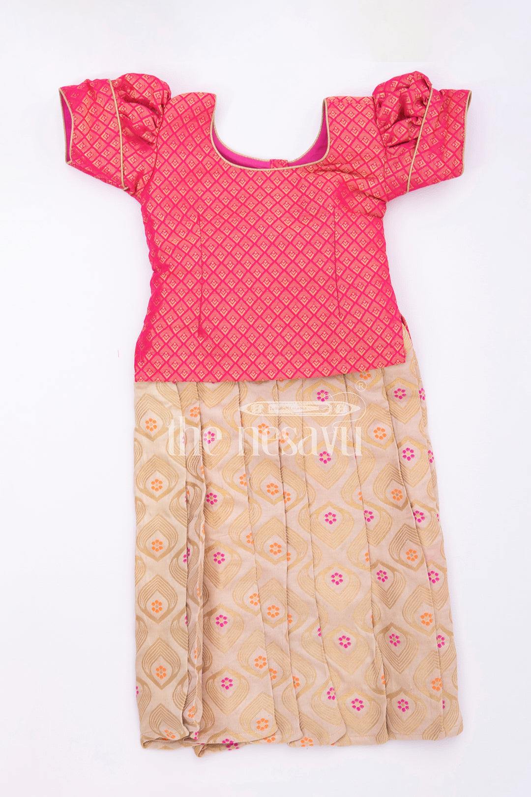 The Nesavu Pattu Pavadai Elegant Pink and Gold Silk Pattu Pavadai for Kids Nesavu Pink and Gold Silk Pattu Pavadai for Kids - Traditional Festive Wear