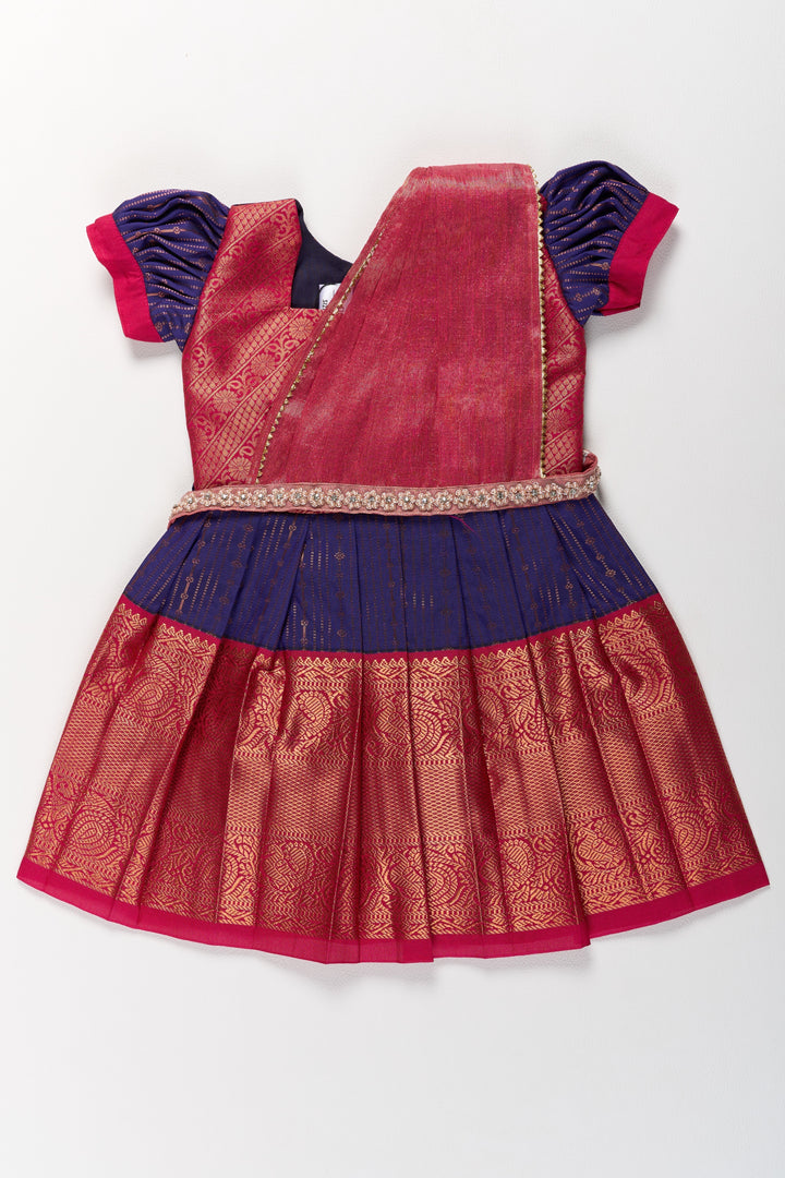 The Nesavu Girls Kanchi Silk Frock Elegant Purple and Red Pattu Pavadai for Girls with Zari Borders and Pleated Skirt Nesavu 14 (6M) / Purple / Style 1 SF827AA-14 Elegant Purple Red Pattu Pavadai Girls Zari Borders Pleated Skirt | The Nesavu