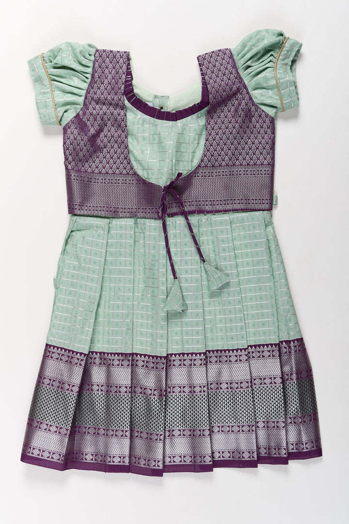 The Nesavu Girls Kanchi Silk Frock Elegant Sea Green and Purple Pattu Pavadai for Girls with Rich Zari Borders Nesavu 20 (3Y) / Green / Style 2 SF839AB-20 Elegant Sea Green Purple Pattu Pavadai Girls Rich Zari Borders | The Nesavu
