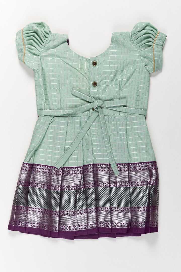The Nesavu Girls Kanchi Silk Frock Elegant Sea Green and Purple Pattu Pavadai for Girls with Rich Zari Borders Nesavu Elegant Sea Green Purple Pattu Pavadai Girls Rich Zari Borders | The Nesavu