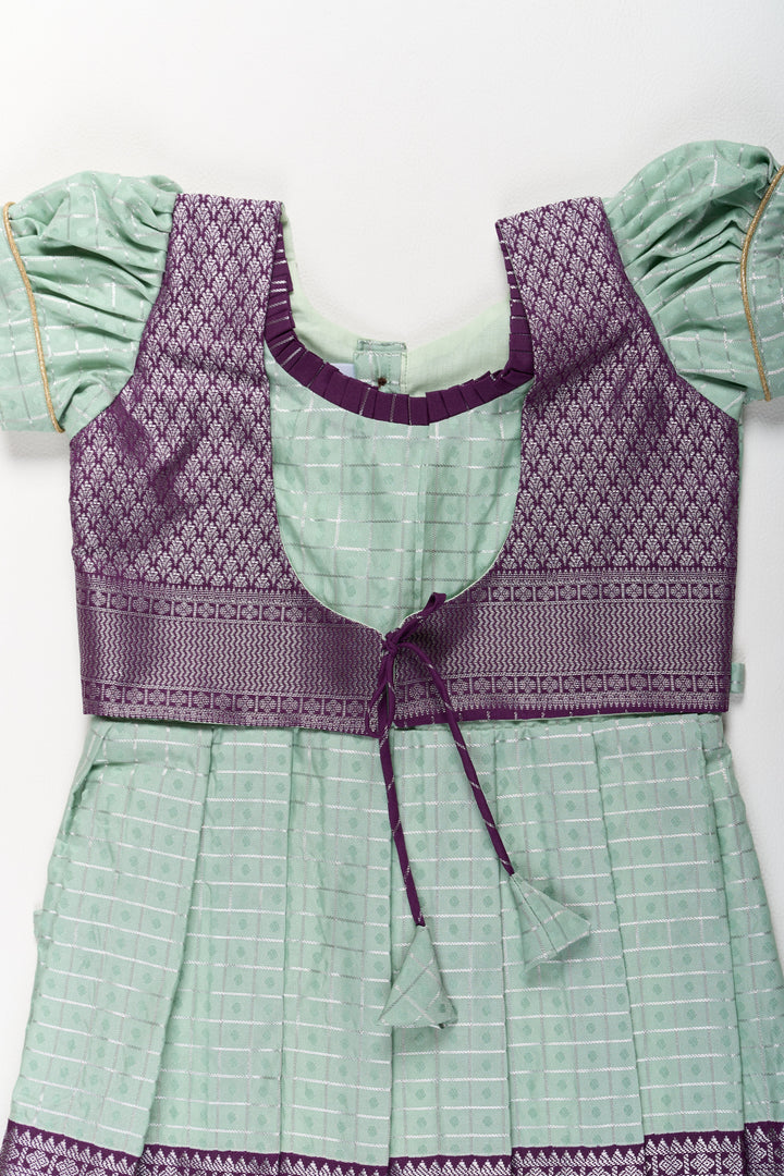The Nesavu Girls Kanchi Silk Frock Elegant Sea Green and Purple Pattu Pavadai for Girls with Rich Zari Borders Nesavu Elegant Sea Green Purple Pattu Pavadai Girls Rich Zari Borders | The Nesavu