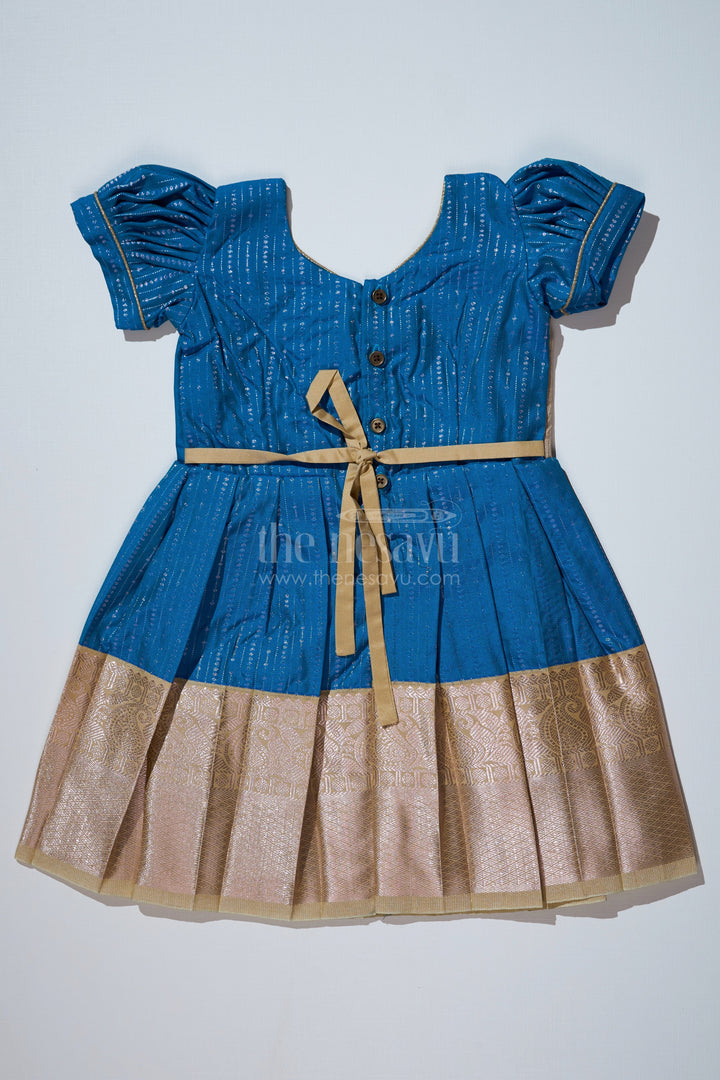 The Nesavu Girls Kanchi Silk Frock Elegant Teal Silk Dress for Girls with Kanchipuram Inspired Fabric and Gold Zari Pleated Border Nesavu Nesavu Teal Silk Dress Girls Kanchipuram Inspired Fabric Gold Zari Pleated Border
