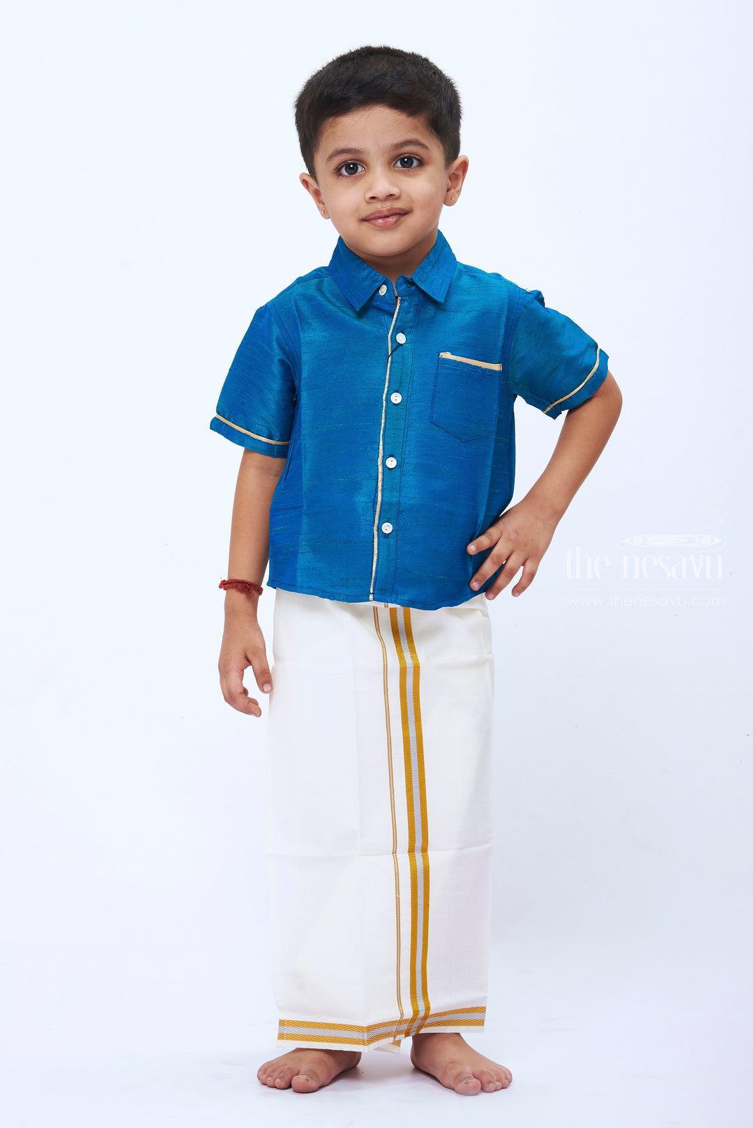 The Nesavu Boys Vesti Elegant White Dothi with DualTone Gold Border Boys Traditional Attire Nesavu Boys Traditional White Dothi with Dual Tone Gold | Ethnic Wear for Festive Occasions | The Nesavu