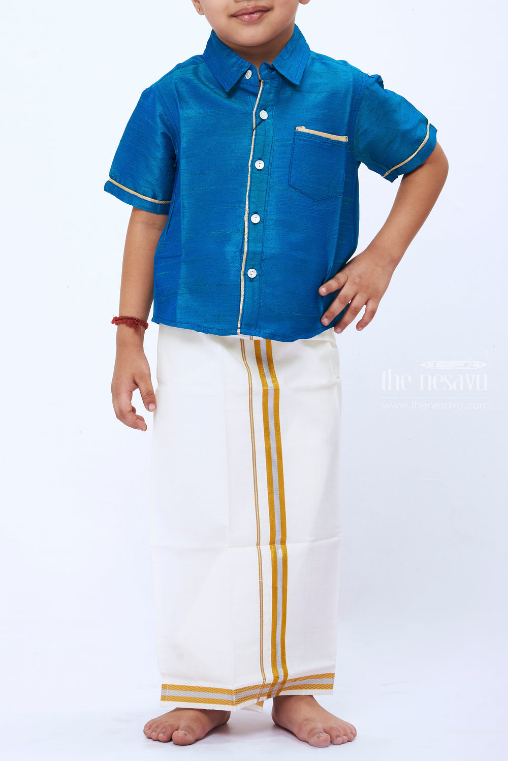 The Nesavu Boys Vesti Elegant White Dothi with DualTone Gold Border Boys Traditional Attire Nesavu Boys Traditional White Dothi with Dual Tone Gold | Ethnic Wear for Festive Occasions | The Nesavu