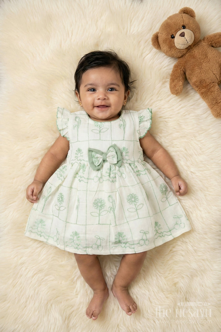 The Nesavu Baby Cotton Frocks Embroidered Cotton Frock for Baby Girls with Classic Bow Accent Nesavu 14 (6M) / Cream / Cotton Blend BFJ911C-14 Nesavu cotton blend frock with floral embroidery and ruffle sleeves for baby girls
