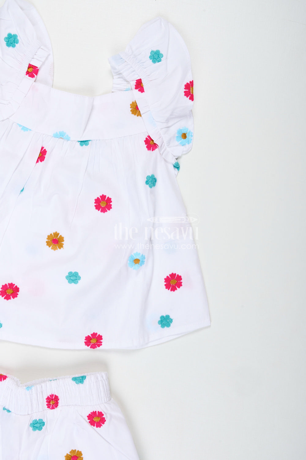 The Nesavu Girls Cotton Frock Embroidered Cotton Outfit for Baby Girls Summer Wear Nesavu Nesavu Baby Girl White Cotton Top Shorts Set Pom-Poms Colorful Thread Embroidery