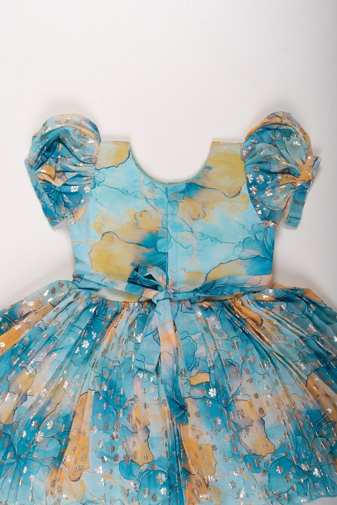 The Nesavu Silk Party Frock Enchanted Garden Silk Party Frock in Blue and Yellow Nesavu Blue & Yellow Floral Silk Frock for Girls | Stone Embroidered Party Dress | The Nesavu