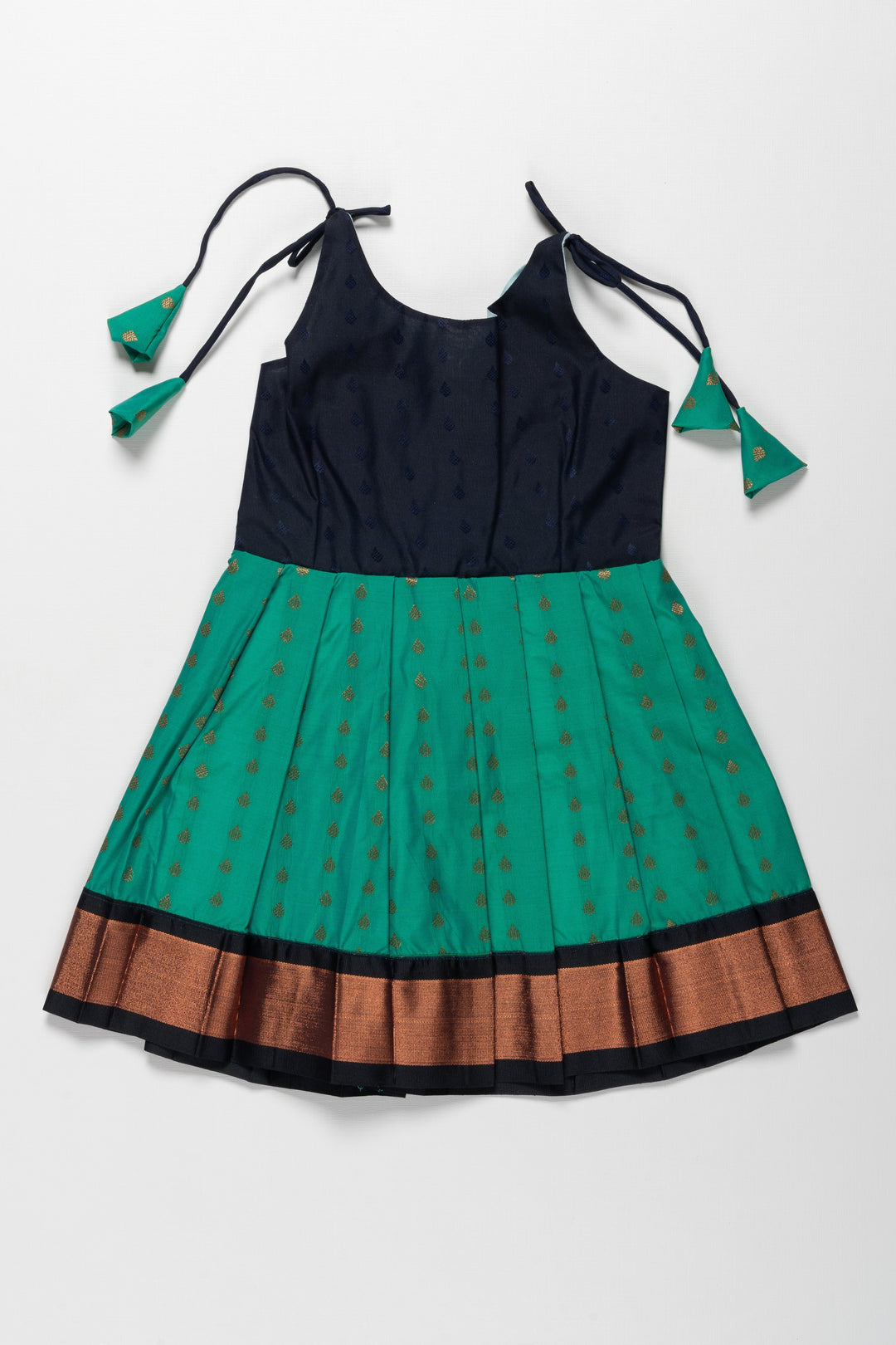 The Nesavu Tie-up Frock Enchanting Green and Bronze Silk Knot-Tie Frock for Ayush Homam and Noolukettu: A Blend of Tradition Nesavu 14 (6M) / Green / Style 4 T378D-14 Chic Green and Bronze Silk Dresses for Girls | Elegant Party Wear with KnotTie Detail | The Nesavu