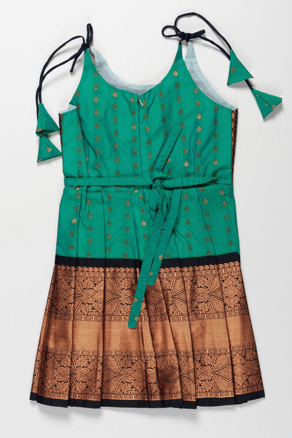 The Nesavu Tie-up Frock Enchanting Green and Bronze Silk Knot-Tie Frock for Ayush Homam and Noolukettu: A Blend of Tradition Nesavu Chic Green and Bronze Silk Dresses for Girls | Elegant Party Wear with KnotTie Detail | The Nesavu