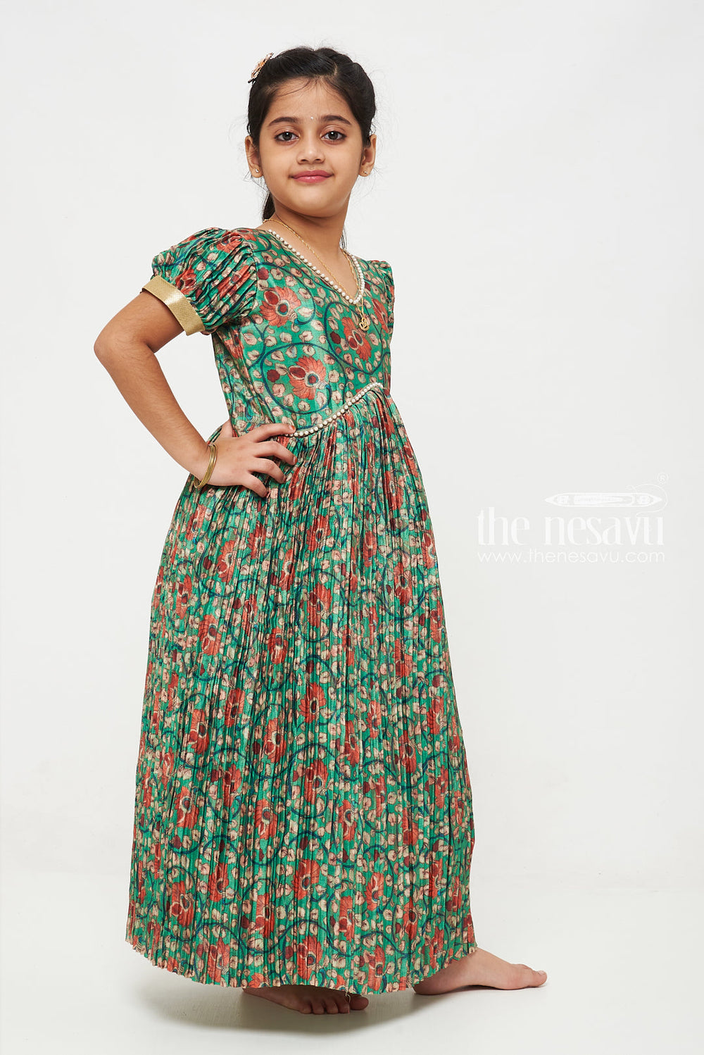 The Nesavu Girls Silk Gown Enchanting Green Floral Anarkali Frock for Girls Nesavu Enchanting Green Floral Anarkali Frock for Girls with Puffed Sleeves