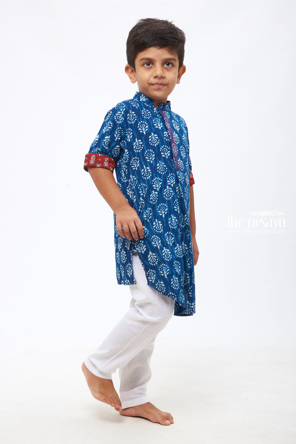The Nesavu Boys Kurtha Set Ethnic Ikat Print Blue Shirt with Traditional Accents & White Pants - Kids Kurta Trousers Combo for Festive Wear Nesavu Dashing Boys Kurta Sets | Festive and Traditional | The Nesavu