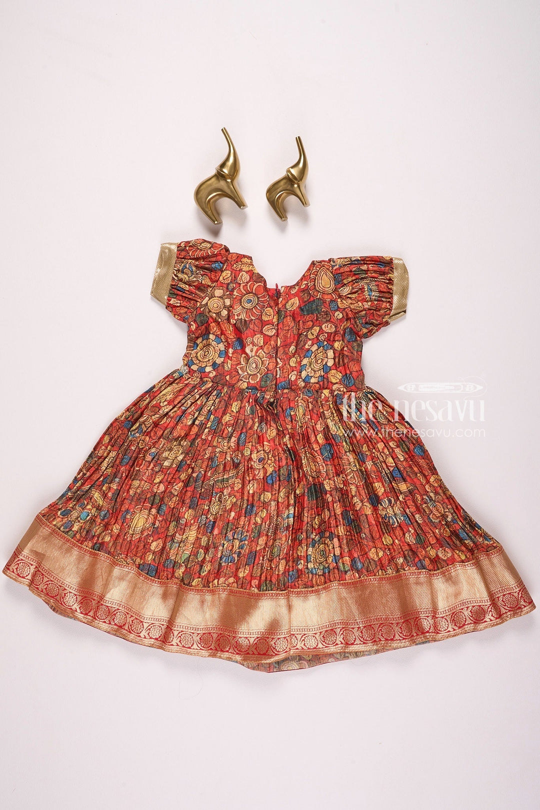 The Nesavu Girls Silk Gown Exquisite Red Kalamkari Chinon Party Gown for Girls Nesavu Exquisite Red Kalamkari Chinon Party Gown for Girls - Festive Wear