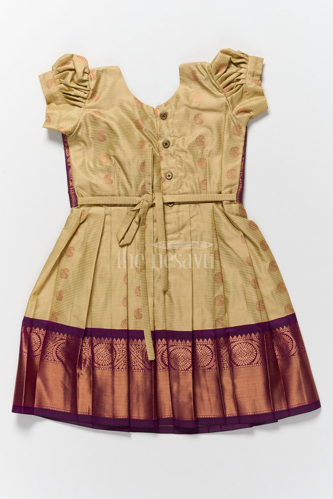 The Nesavu Girls Kanchi Silk Frock Festive Kanchi Silk Frock for Pongal with Brocade Accents and Puff Sleeves Nesavu Pongal Dress Offers Purple Gold Kanchi Silk Frock Girls Nesavu