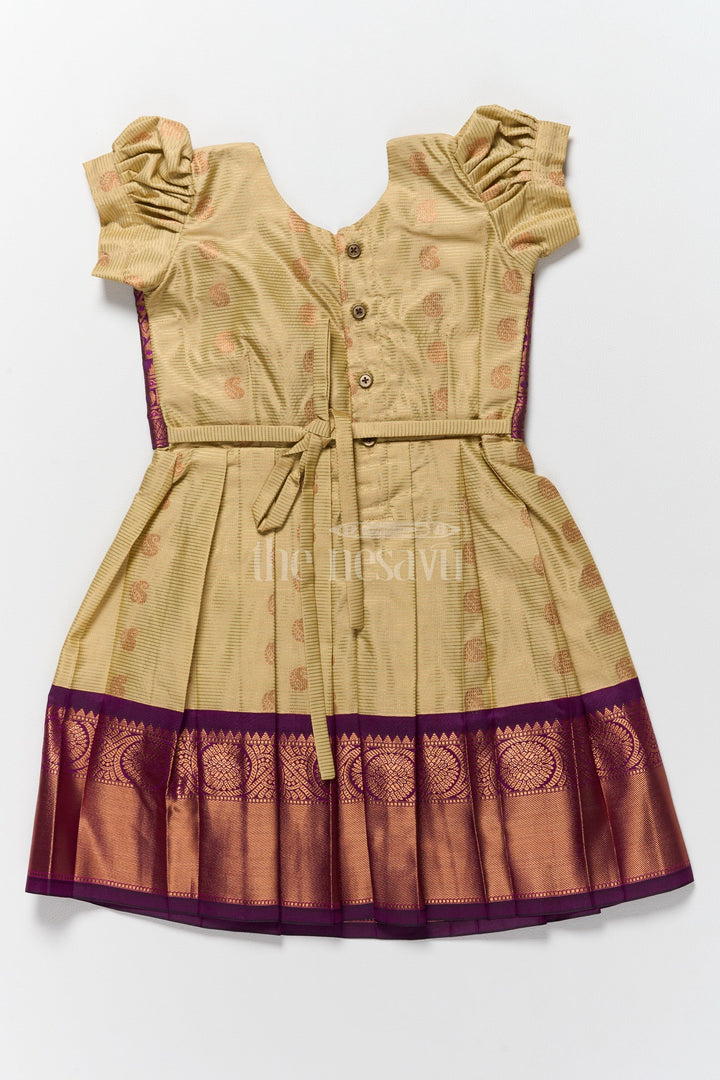 The Nesavu Girls Kanchi Silk Frock Festive Kanchi Silk Frock for Pongal with Brocade Accents and Puff Sleeves Nesavu Pongal Dress Offers Purple Gold Kanchi Silk Frock Girls Nesavu