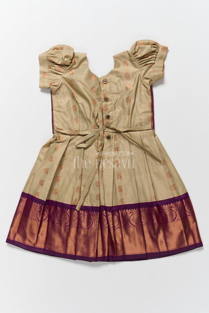 The Nesavu Girls Kanchi Silk Frock Festive Outfit for Pongal Girls Kanchi Silk Frock with Sophisticated Purple and Gold Accents Nesavu Pongal Outfit Girls Purple Gold Kanchi Silk Frock Nesavu Zari Accents