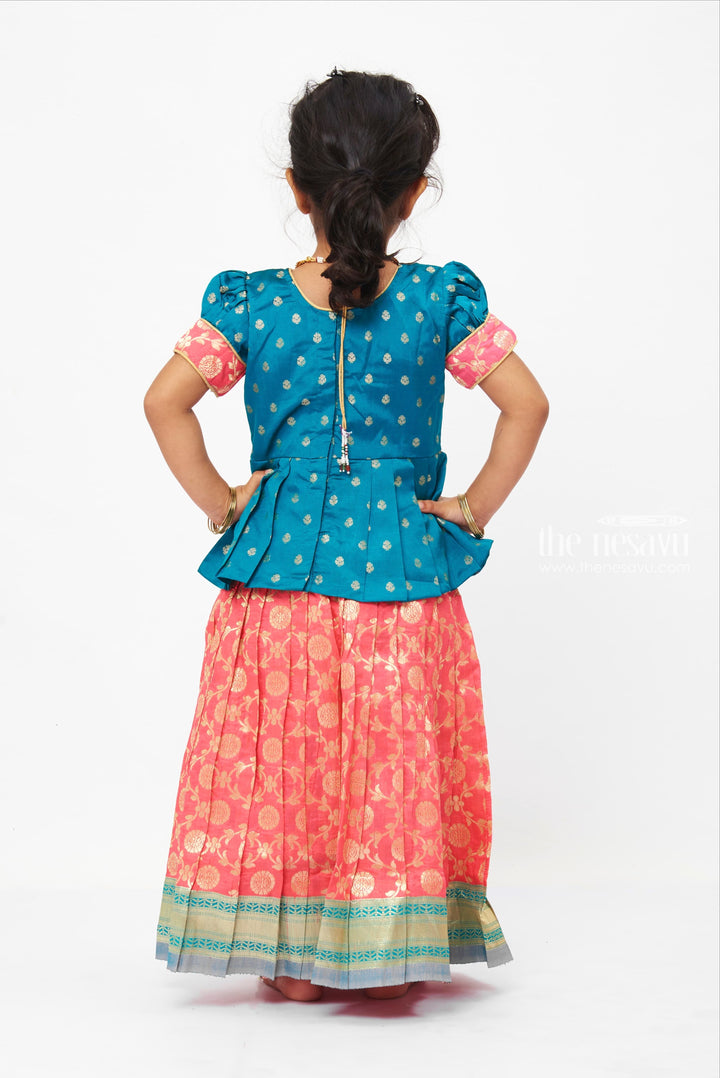 The Nesavu Pattu Pavadai Floral Butta Green Peplum Blouse combined with Banarasi Pink Pattu Pavadai Traditional Festive Wear Nesavu Banaras Designer Pattu Pavadai | Silk Skirt With Blouse for Girls | the Nesavu