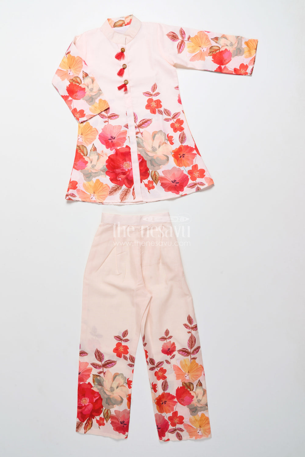 The Nesavu Girls Co-Ord Sets Foral Cotton Sharara Set for Girls for Ethnic School Events Nesavu Nesavu cream floral print cotton sharara set for girls with tassel details festive school ethnic wear