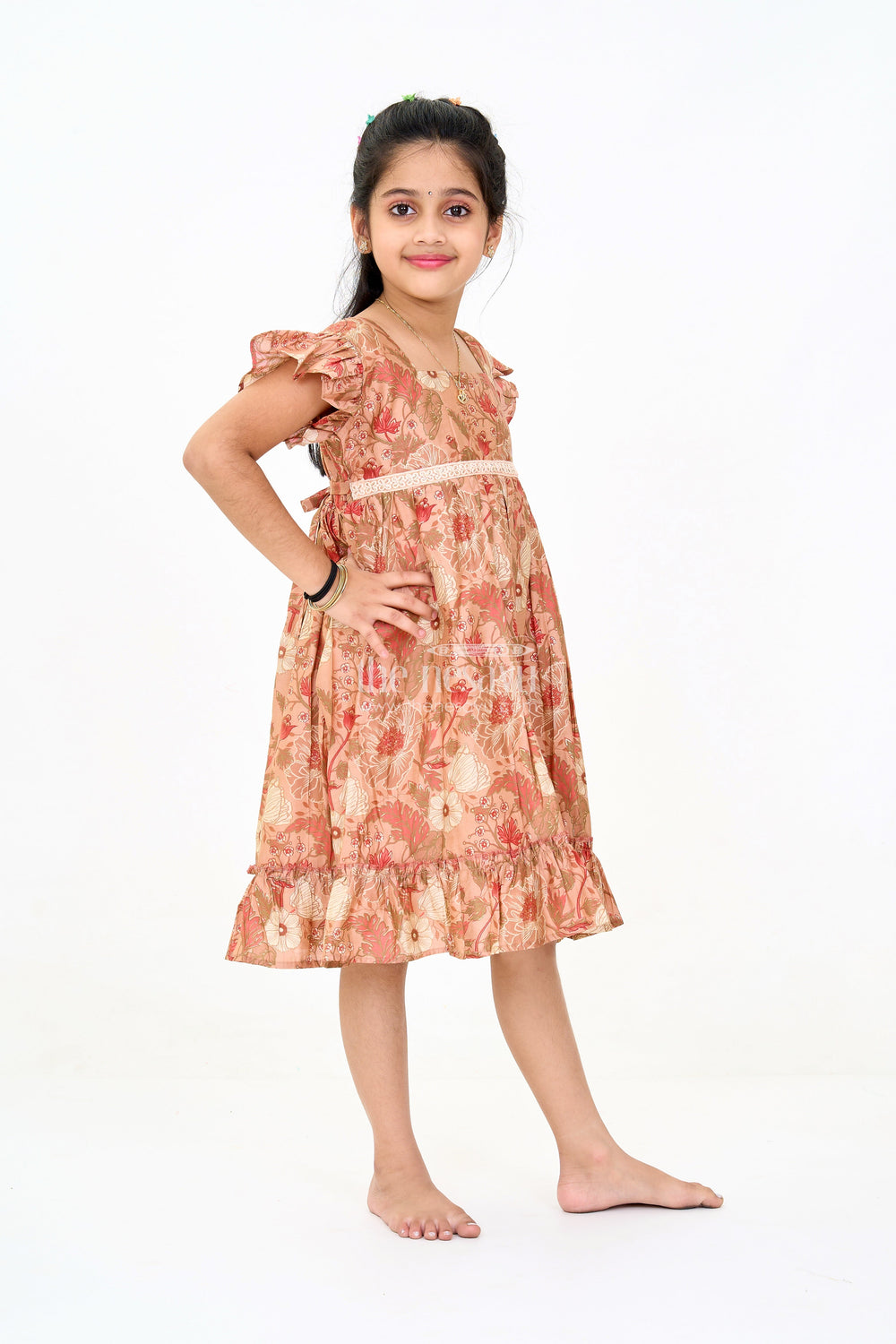 The Nesavu Girls Cotton Frock Frills Frock for Girls in Warm Beige Floral Print with Lace Detailing Nesavu Nesavu Beige Floral Frills Frock Girls Ruffled Hem Lace Detailing
