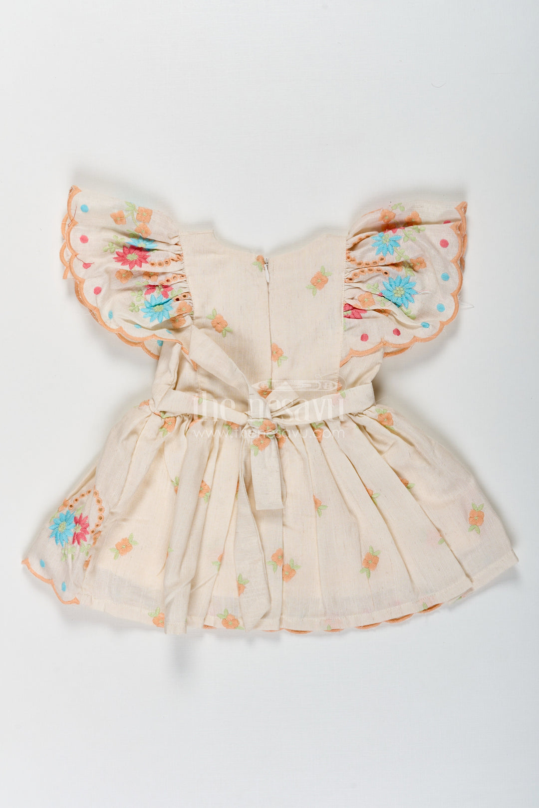 The Nesavu Baby Cotton Frocks Frock Baby in Cream Cotton with Multicolor Thread Embroidery and Angel Sleeves Nesavu Frock Baby Cream Cotton Multicolor Thread Embroidery Angel Sleeves | The Nesavu
