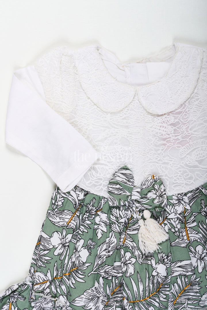 The Nesavu Baby Fancy Frock Frock for Photoshoot in Soft Net with Embroidered Yoke and Leafy Green Digital Print Skirt for Baby Girls Nesavu Baby Girl Frock Photoshoot Soft Net Embroidered Top Leaf Digital Print Skirt | The Nesavu
