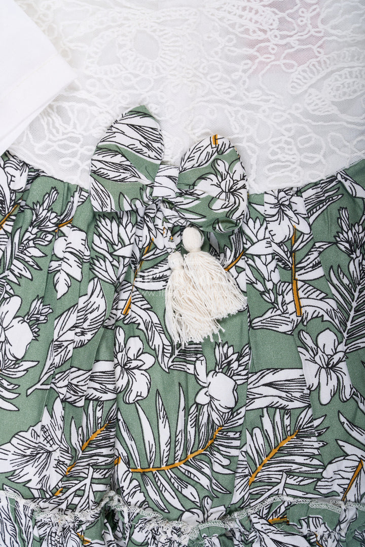 The Nesavu Baby Fancy Frock Frock for Photoshoot in Soft Net with Embroidered Yoke and Leafy Green Digital Print Skirt for Baby Girls Nesavu Nesavu Baby Girl Frock Photoshoot Soft Net Embroidered Top Leaf Digital Print Skirt