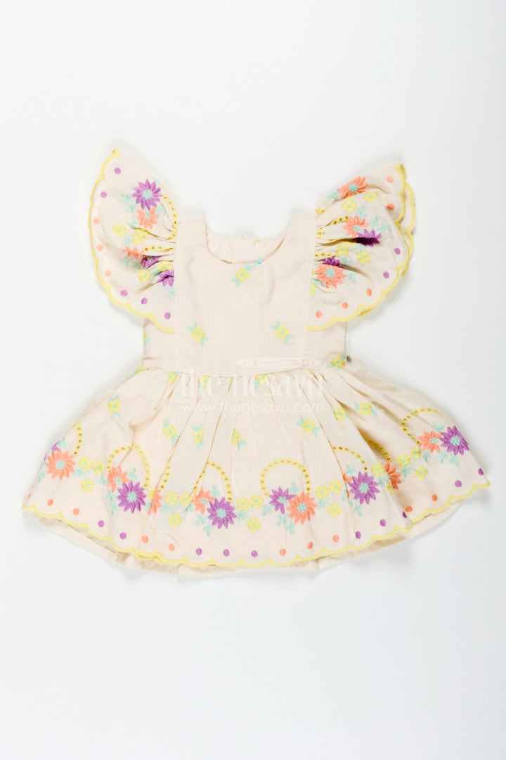 The Nesavu Baby Cotton Frocks Frock Party Wear for Baby Girls in Cotton with Vibrant Thread Embroidery and Butterfly Sleeves Nesavu Frock Party Wear Baby Girls Cream Cotton Floral Thread Embroidery | The Nesavu