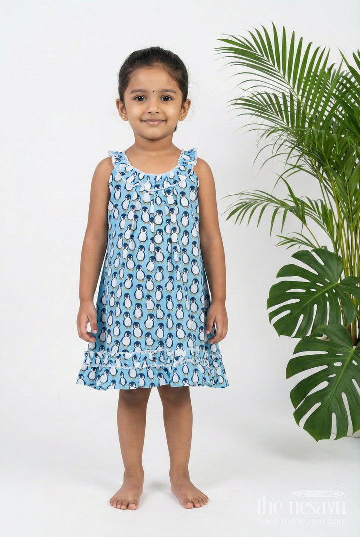 The Nesavu Girls Cotton Frock Girls Affordable Cotton Frock with Blue Penguin Hand Block Print and Frill Accents for Comfortable Wear Nesavu 18 (2Y) / Blue GFC1796A-18 Nesavu Blue Hand Block Printed Affordable Cotton Frock Girls Penguin Motif Ruffle Details