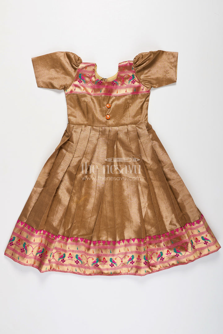 The Nesavu Girls Silk Gown Girls Anarkali Style Gown in Brown Tissue with Paithani Border and Structured Pleats Nesavu Girls Anarkali Style Gown Brown Tissue Silk Paithani Border Puff Sleeves | The Nesavu