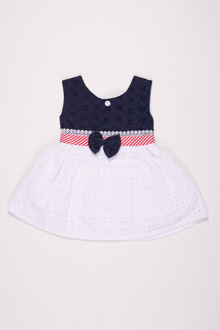 The Nesavu Baby Cotton Frocks Girls Black Cotton Frock with Eyelet Embroidery and Striped Bow Detail for Special Occasions Nesavu 14 (6M) / Black BFJ643B-14 Nesavu Girls Black White Cotton Frock Eyelet Embroidery Bow Special Events