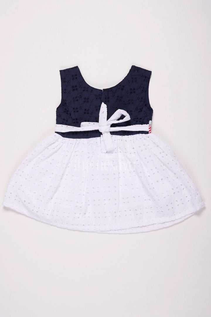 The Nesavu Baby Cotton Frocks Girls Black Cotton Frock with Eyelet Embroidery and Striped Bow Detail for Special Occasions Nesavu Nesavu Girls Black White Cotton Frock Eyelet Embroidery Bow Special Events