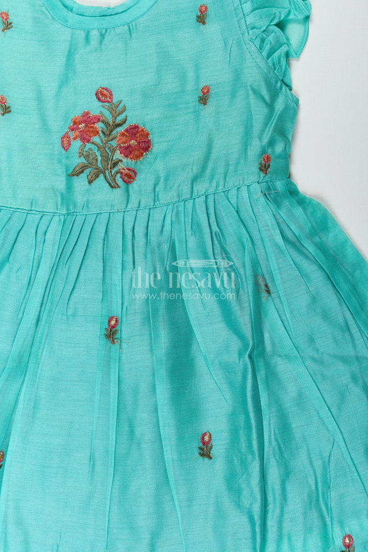 The Nesavu Girls Chanderi Frock Girls Blue Colour Frock Suit in Chanderi with Bold Floral Embroidery and Elegant Flutter Sleeves Nesavu Girls Blue Colour Frock Suit Chanderi Fabric Bold Floral Embroidery Flutter Sleeves | The Nesavu