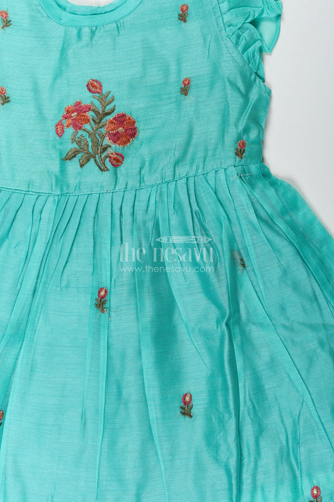 The Nesavu Girls Chanderi Frock Girls Blue Colour Frock Suit in Chanderi with Bold Floral Embroidery and Elegant Flutter Sleeves Nesavu Nesavu Girls Blue Colour Frock Suit Chanderi Fabric Bold Floral Embroidery Flutter Sleeves