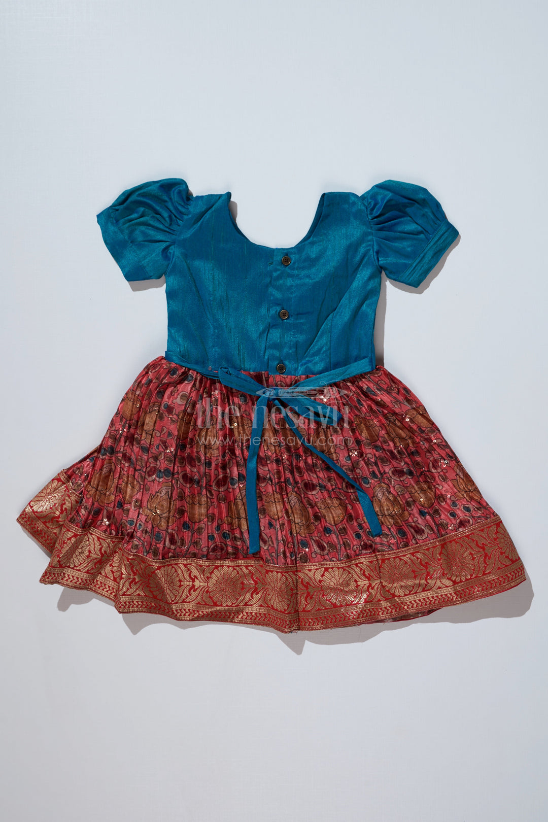 The Nesavu Silk Frock Girls Blue Ethnic Dress with Puff Sleeves and Chinon Silk Pleated Skirt for Festive Wear Nesavu Girls Blue Ethnic Dress Puff Sleeves Chinon Silk Pleated Skirt | The Nesavu